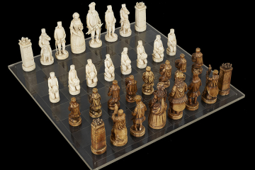 Schachfiguren sind als Berg- und Hüttenleute dargestellt.