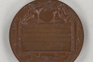 Das Bild zeigt eine Medaille aus Bronze